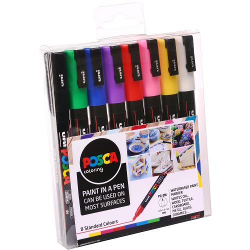 Set of Posca paint markers in various colors with packaging on a white background
