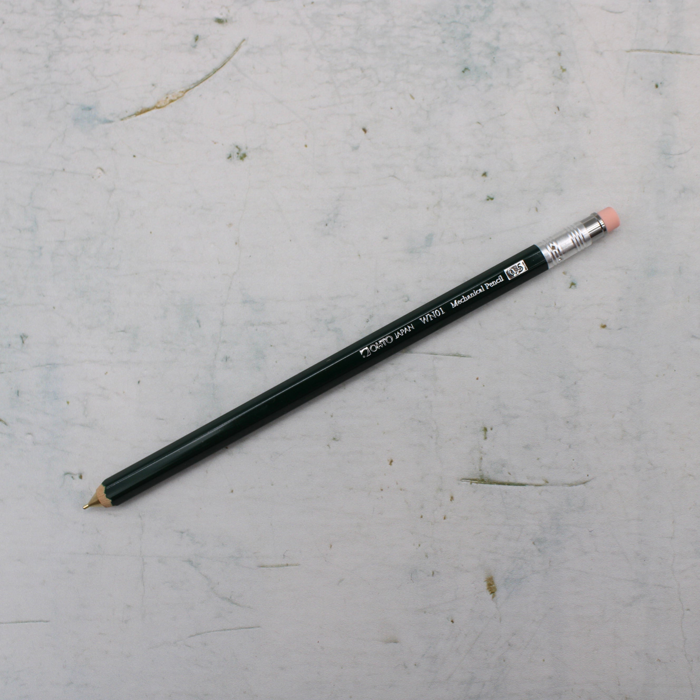 A Green wooden mechanical pencil from the Pencil Me In stationery shop. 